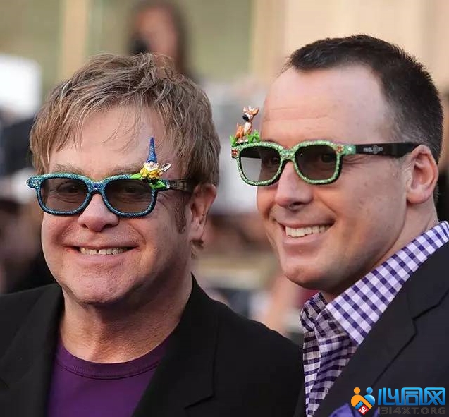 Elton John, 68, and David Furnish, 53